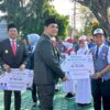 Bupati Shalahuddin Serahkan Bantuan SIP Pintar Juara kepada 4.104 Siswa